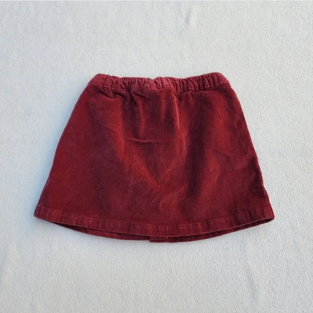 Girls 2 tops and skirt bundle Size 4-5
